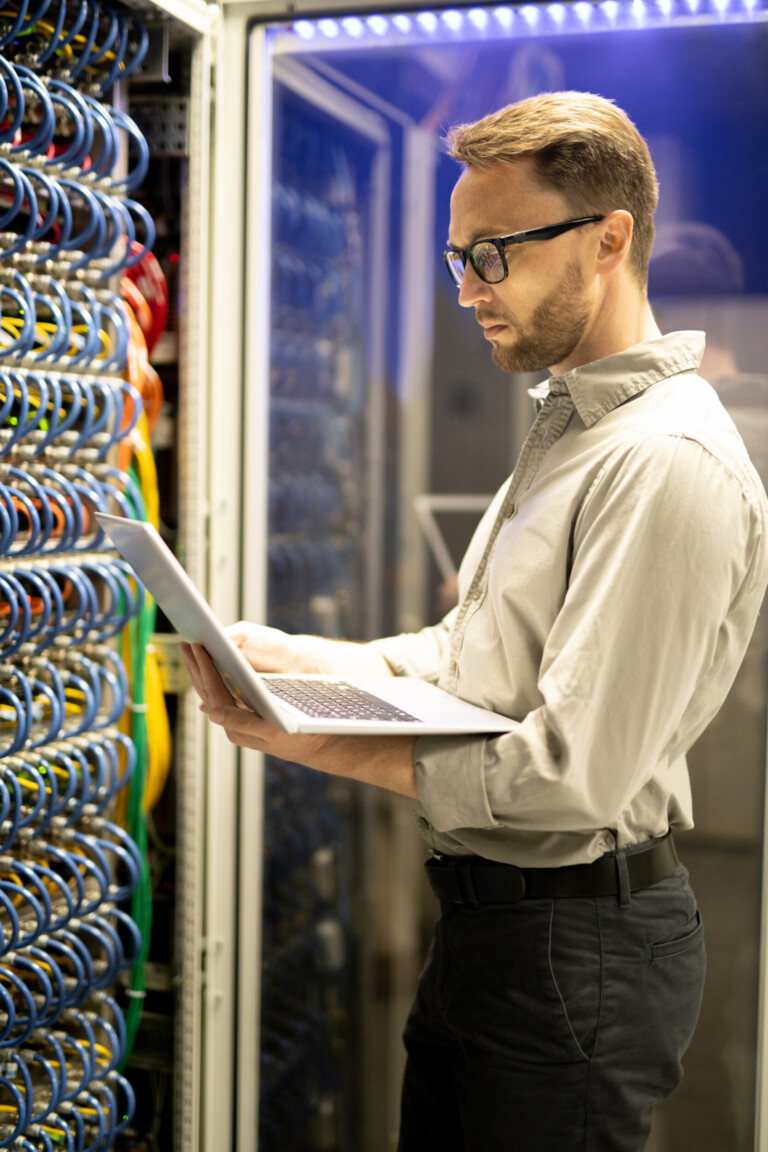 programmer examining server